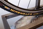 Continental Gatorskin Continental Gatorskin road bike tire on a rolling resistance test machine