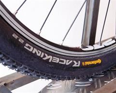 Continental Race King Performance Continental Race King Performance mountain bike tire on a rolling resistance test machine