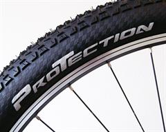 Continental Race King Protection Continental Race King Protection mountain bike tire on a rolling resistance test machine