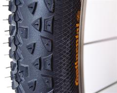 Continental Race King Sport Continental Race King Sport mountain bike tire on a rolling resistance test machine