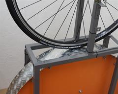 Michelin Power All Season Michelin Power All Season road bike tire on a rolling resistance test machine