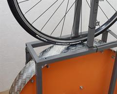 Michelin Power Endurance Michelin Power Endurance road bike tire on a rolling resistance test machine