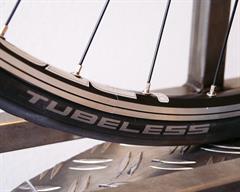 Schwalbe One Tubeless Schwalbe One Tubeless road bike tire on a rolling resistance test machine
