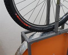 Specialized S-Works Fast Trak Specialized S-Works Fast Trak mountain bike tire on a rolling resistance test machine