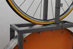 Specialized Turbo Cotton Specialized Turbo Cotton road bike tire on a rolling resistance test machine