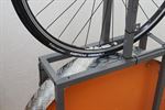Michelin Power Competition Michelin Power Competition road bike tire on a rolling resistance test machine