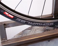 Schwalbe Ironman Tubeless Schwalbe Ironman Tubeless road bike tire on a rolling resistance test machine
